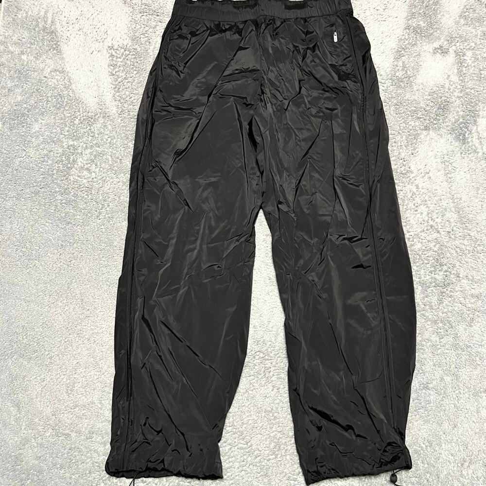Athleta Rise Pants Womens Large Black Baggy Travel Zip Pockets Stretch 472261